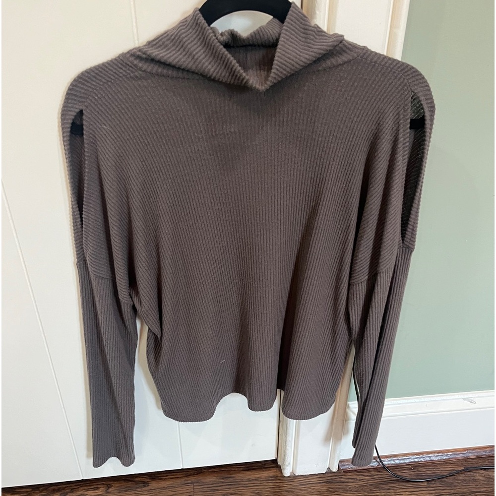 Turtleneck with open shoulder